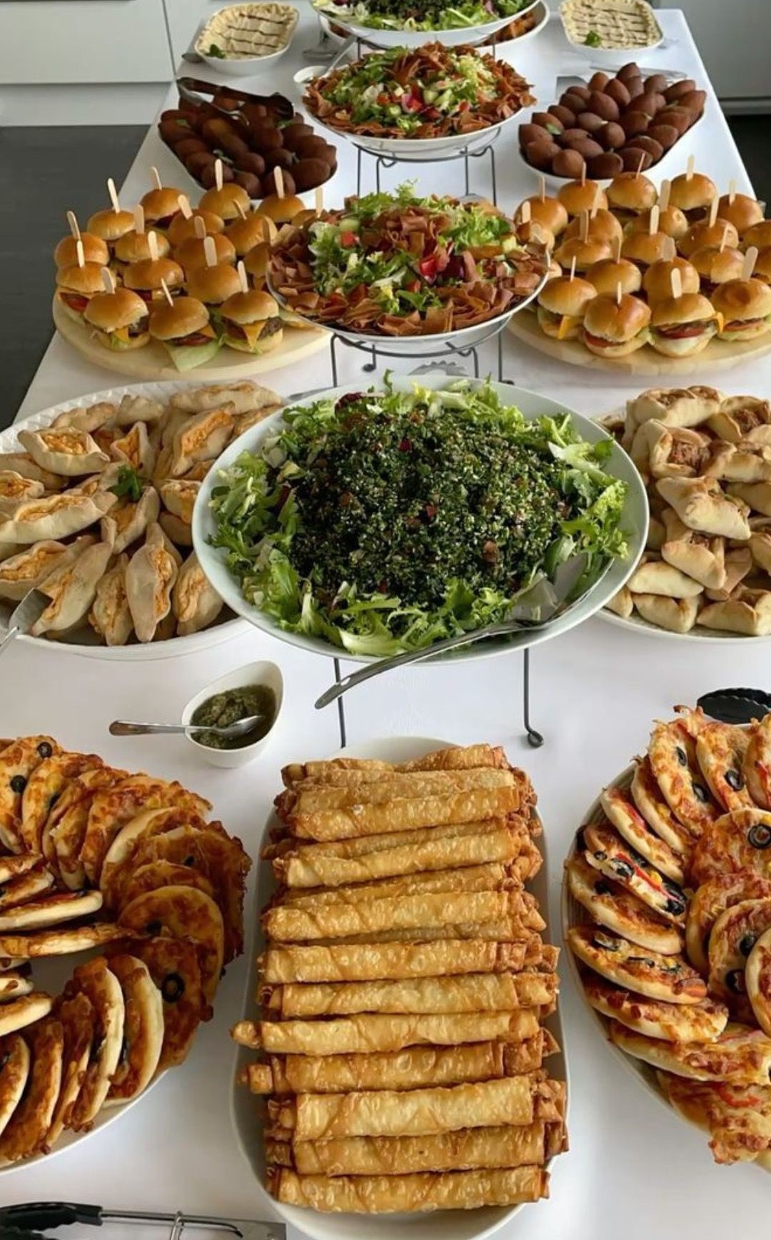 Lebanese buffet with mini sliders and traditional dishes
