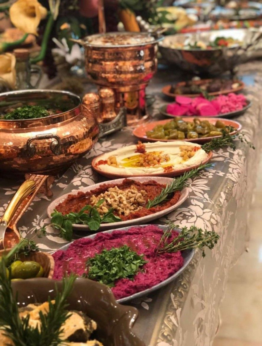 Traditional Lebanese mezze with copper serving dishes